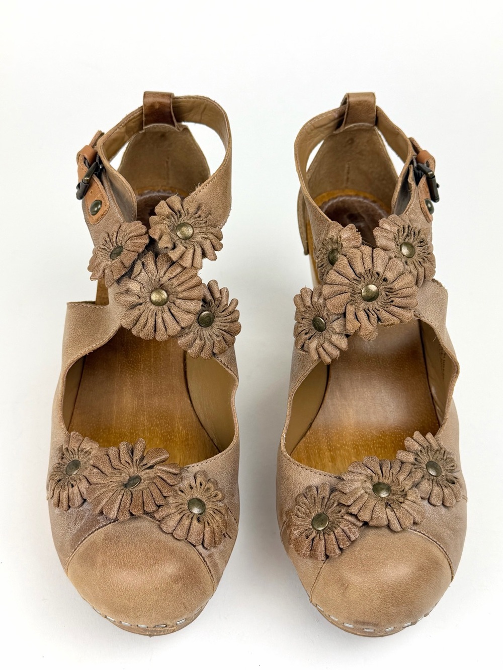 Anthropologie’s Albright Sloane Flower Appliqué Clogs.